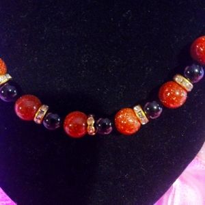 Beautiful gold stone and obsidian bracelet and necklace